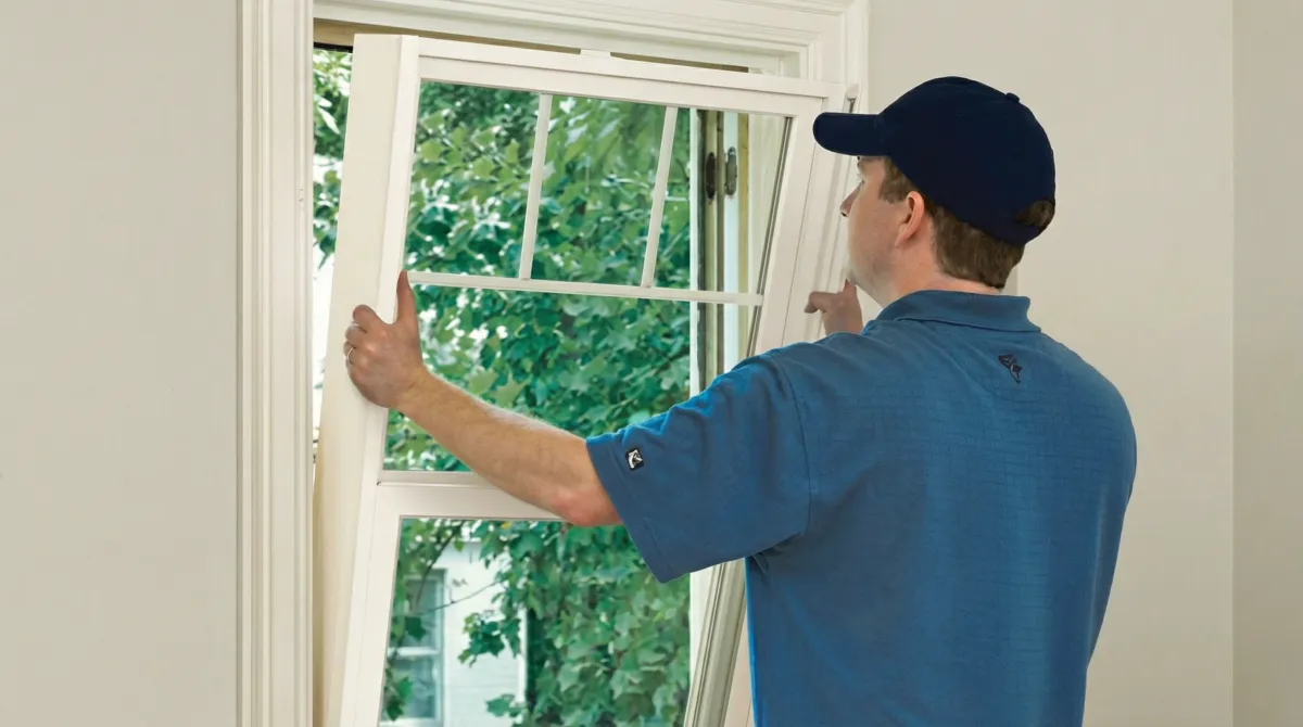 Professional contractors performing a residential window insulation and replacement service in Spokane, WA